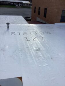 stenciled roof on firehouse
