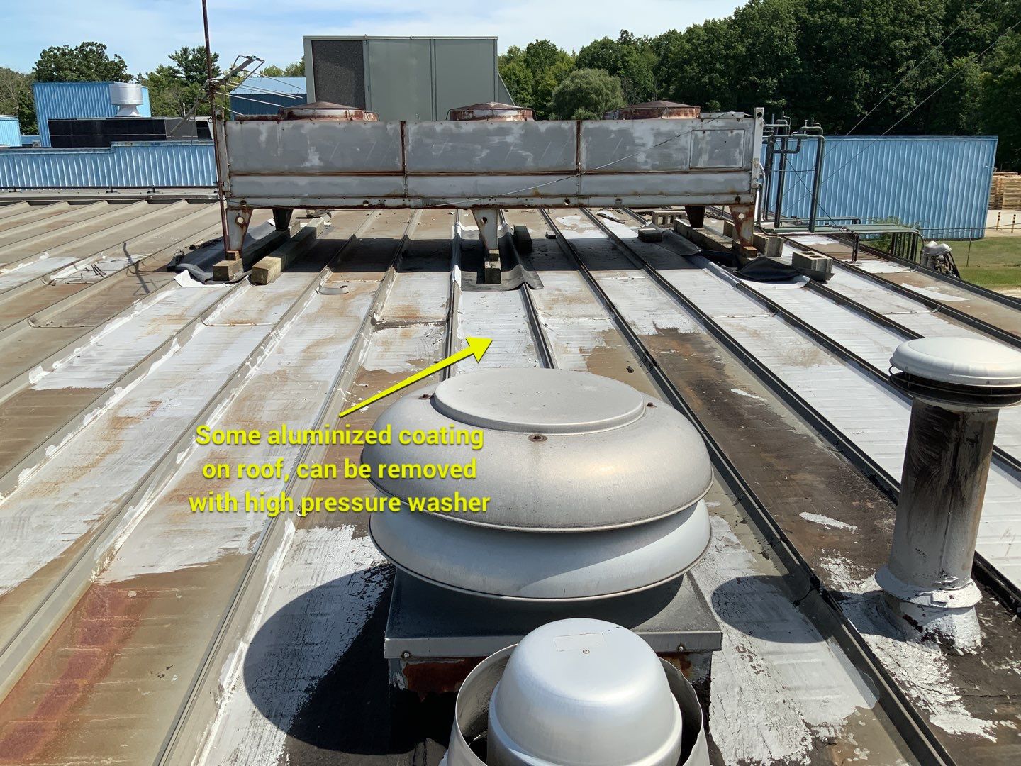 some aluminized coating on roof, can be removed with high pressure washer