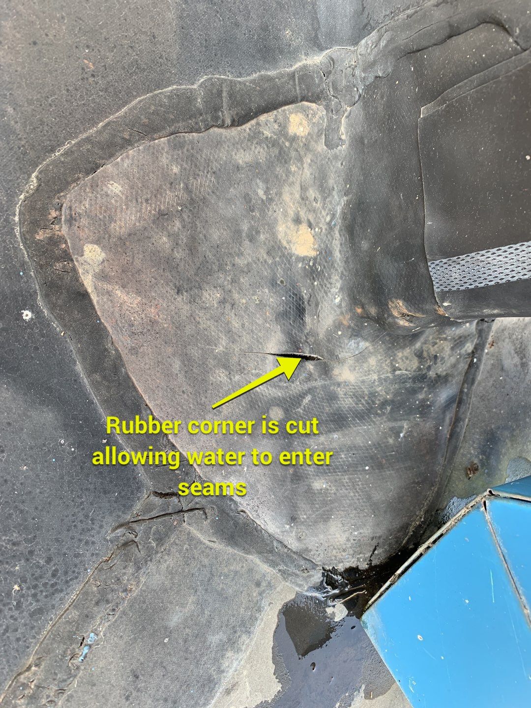 rubber corner is cut allowing water to enter seams