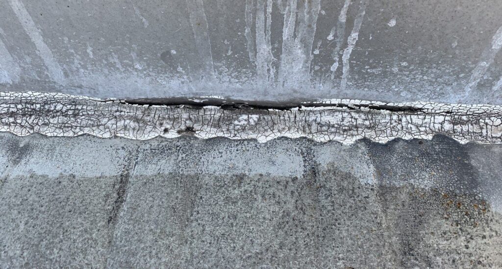 cracked sealant on commercial roof